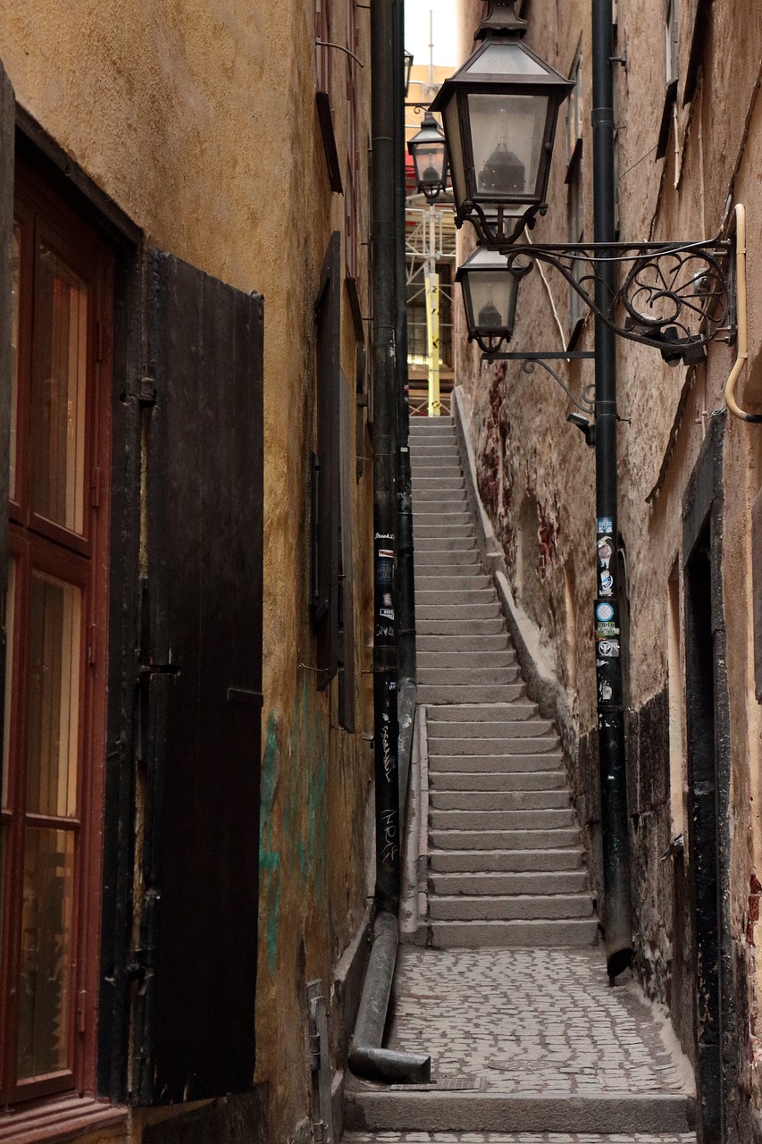 stairs narrow alley high houses free photo