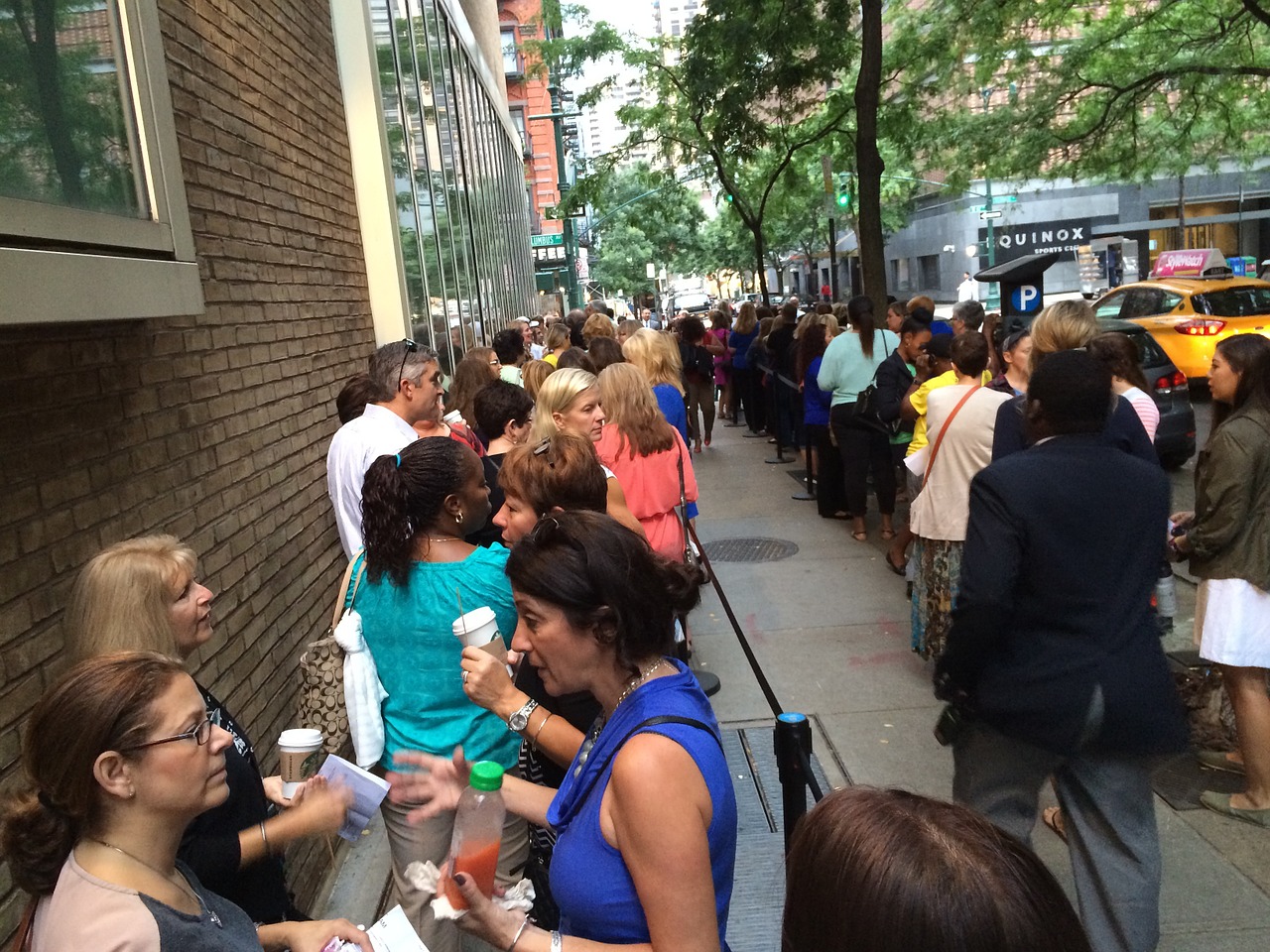 standing in line women morning free photo