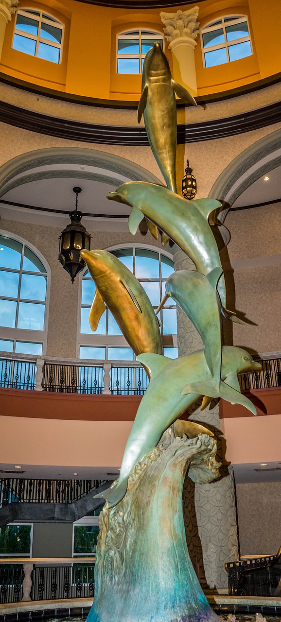 statue dolphins gaylord palms free photo