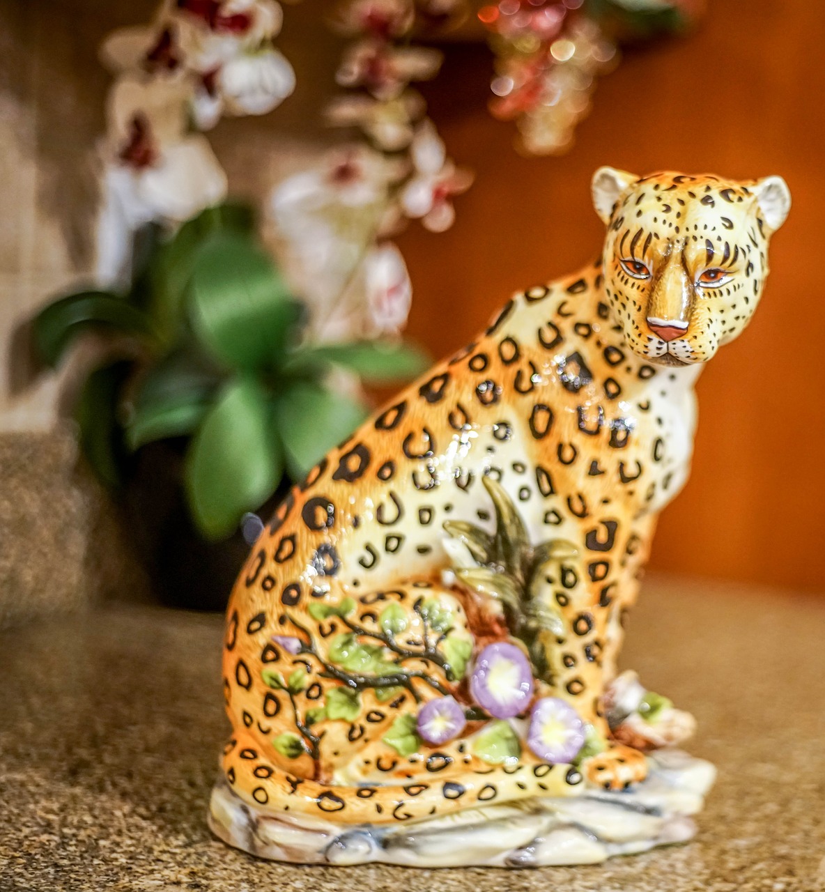 statue leopard bokeh free photo