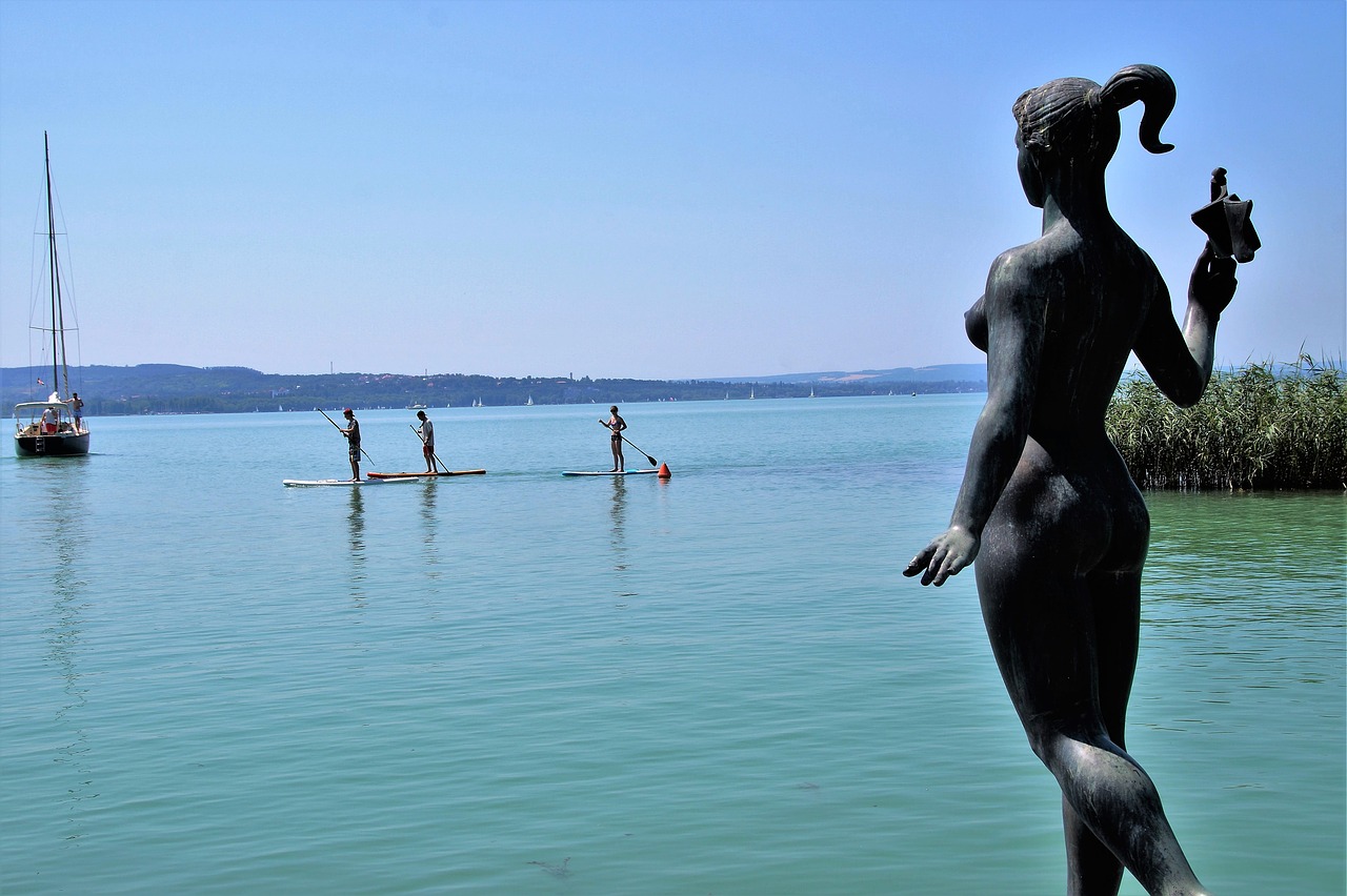 statue lake stand up paddle free photo