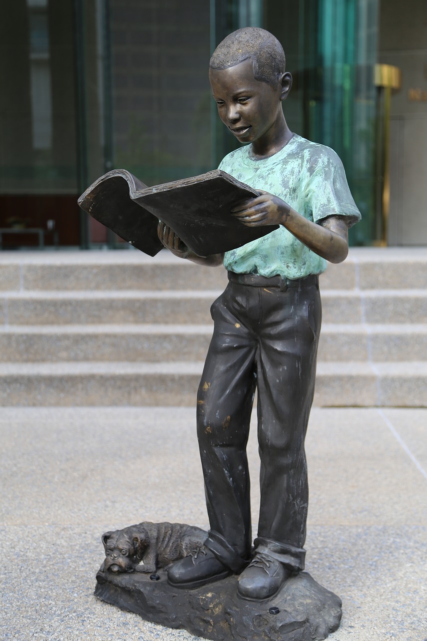 statue boy book free photo