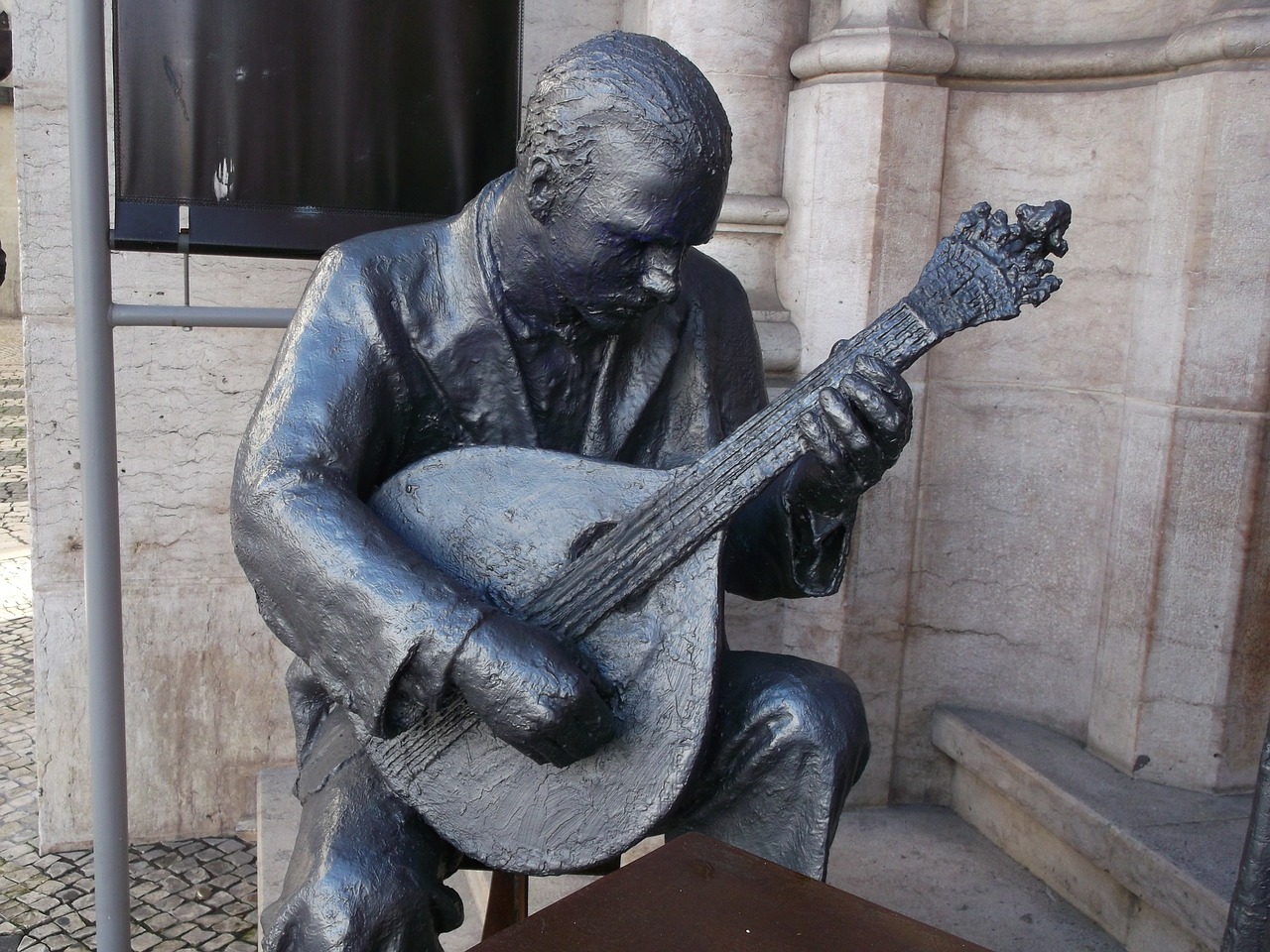 statue fado singer man free photo