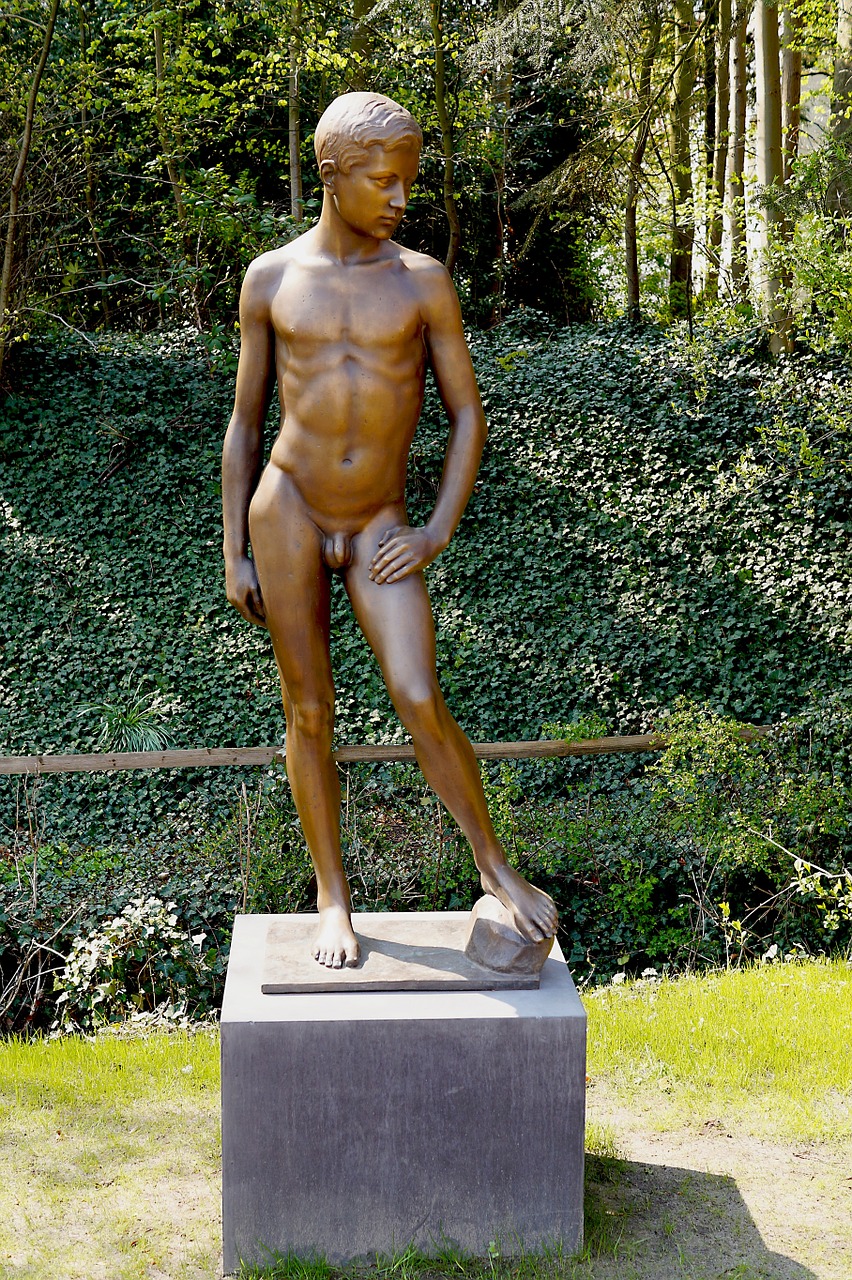 statue bronze young man free photo