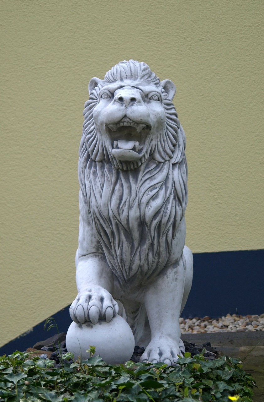 statue lion stone figure free photo