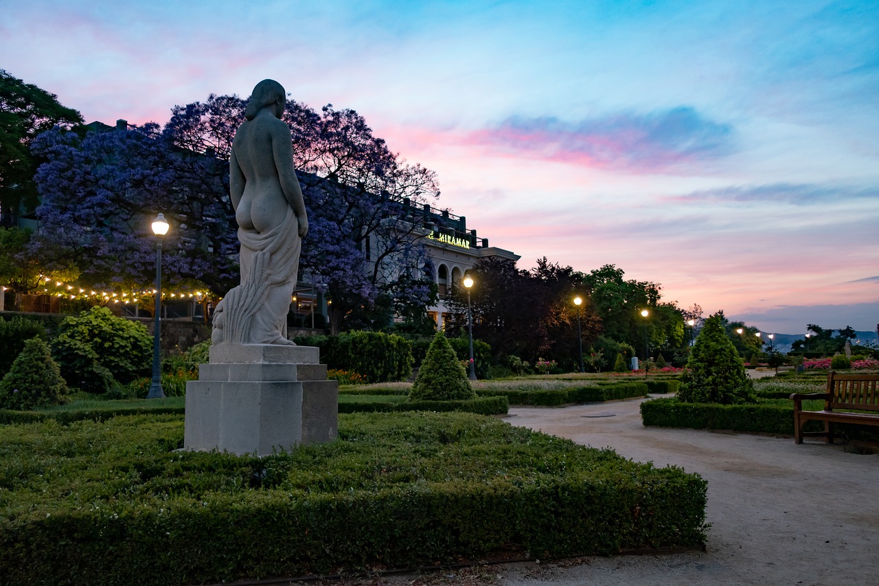 statue  sunset  sky free photo