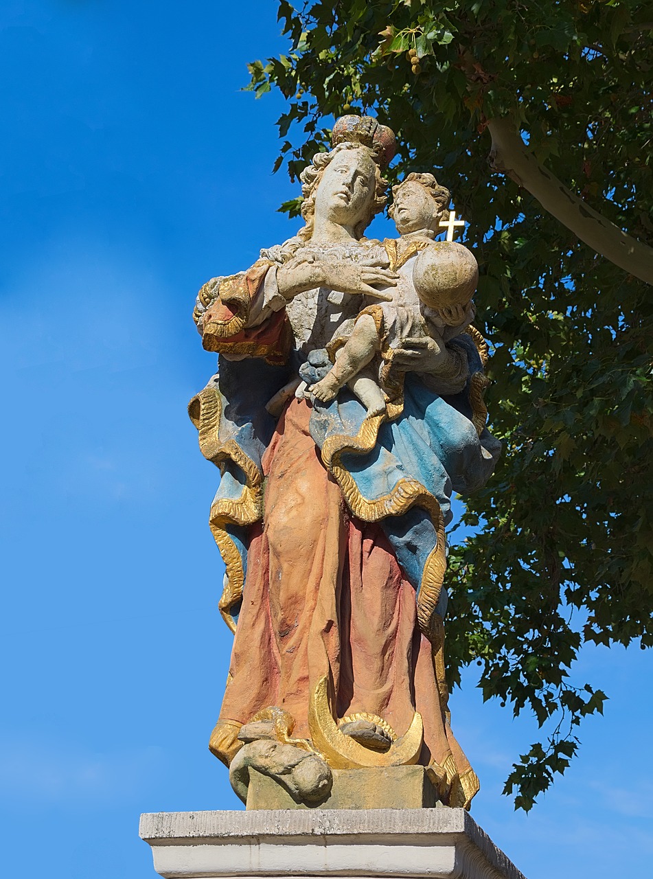 statue  stone  colorful free photo