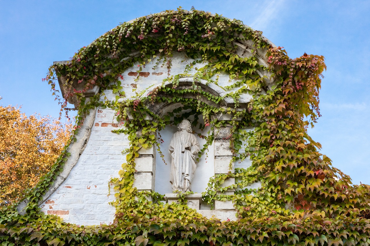 statue  leaves  art free photo