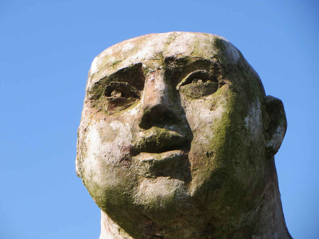 statue stone face free photo