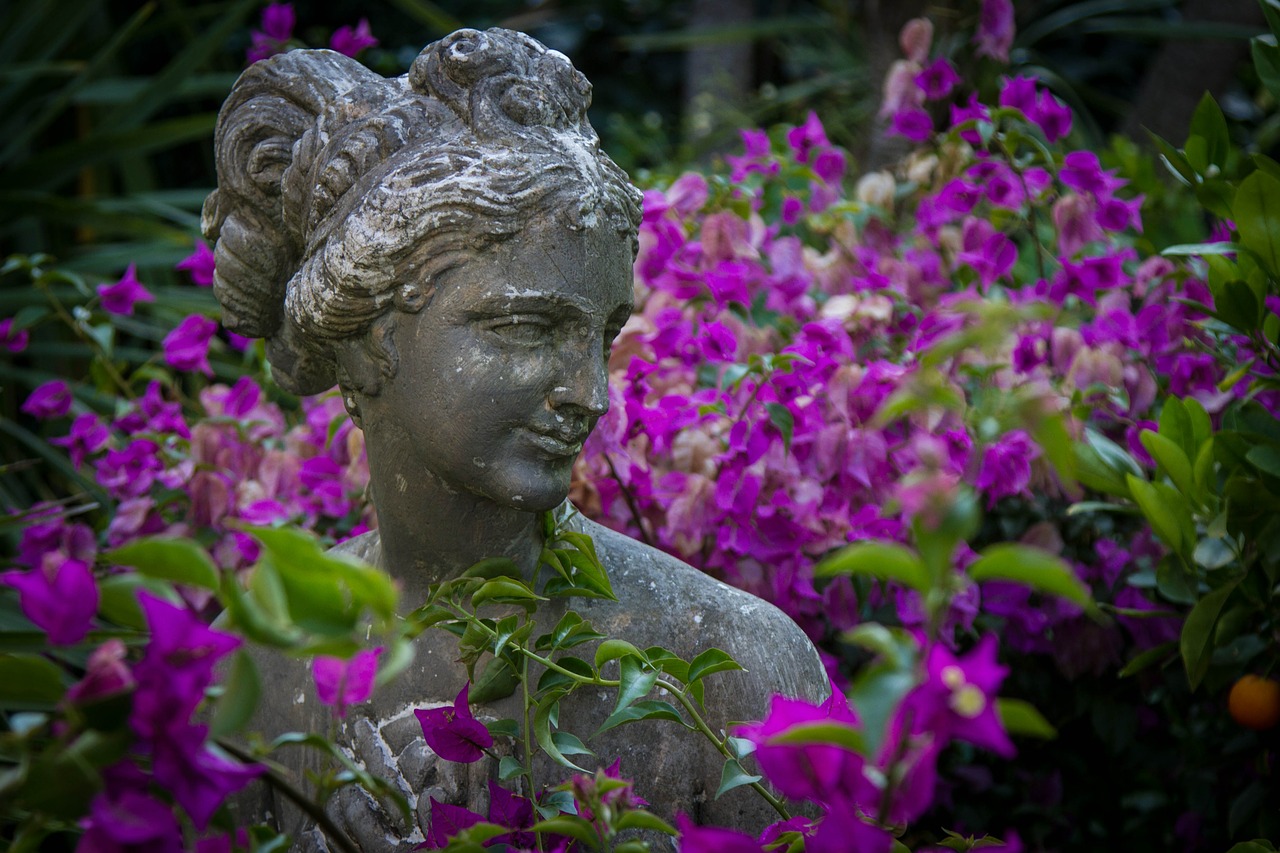 statue flowers garden free photo