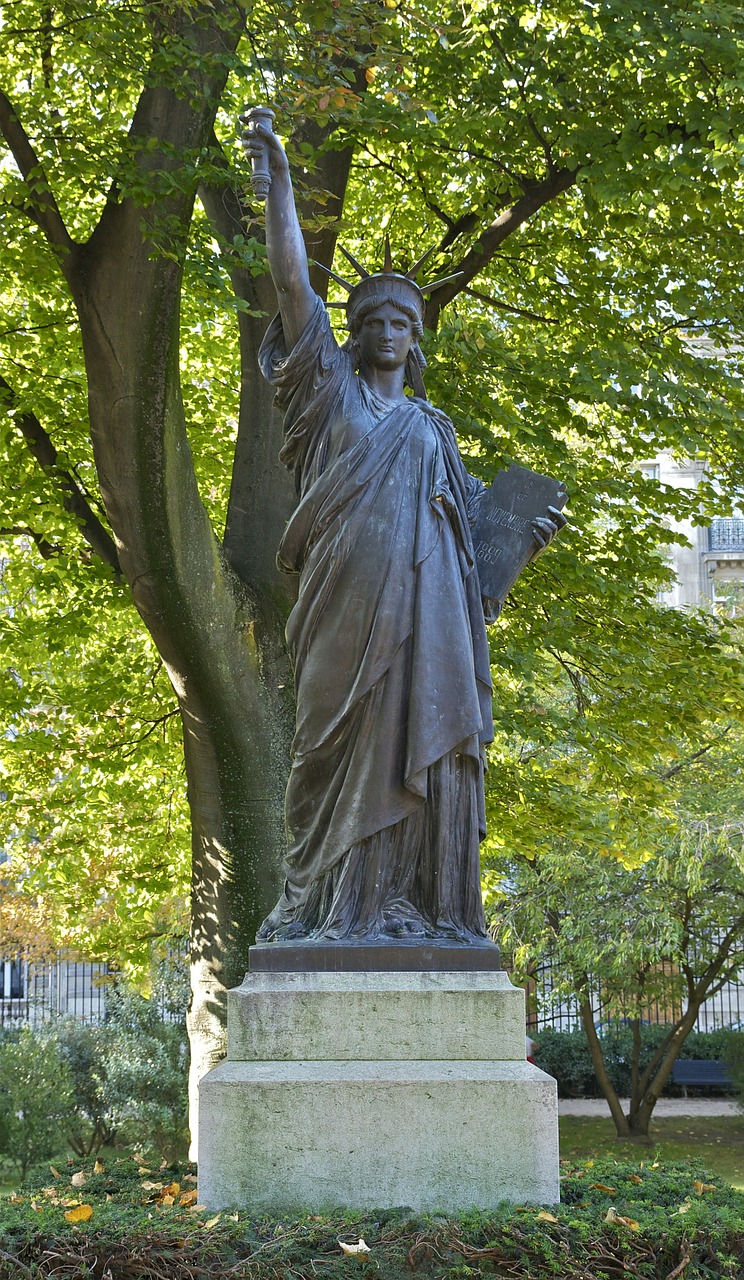 statue liberty illuminating the world luxembourg garden free photo