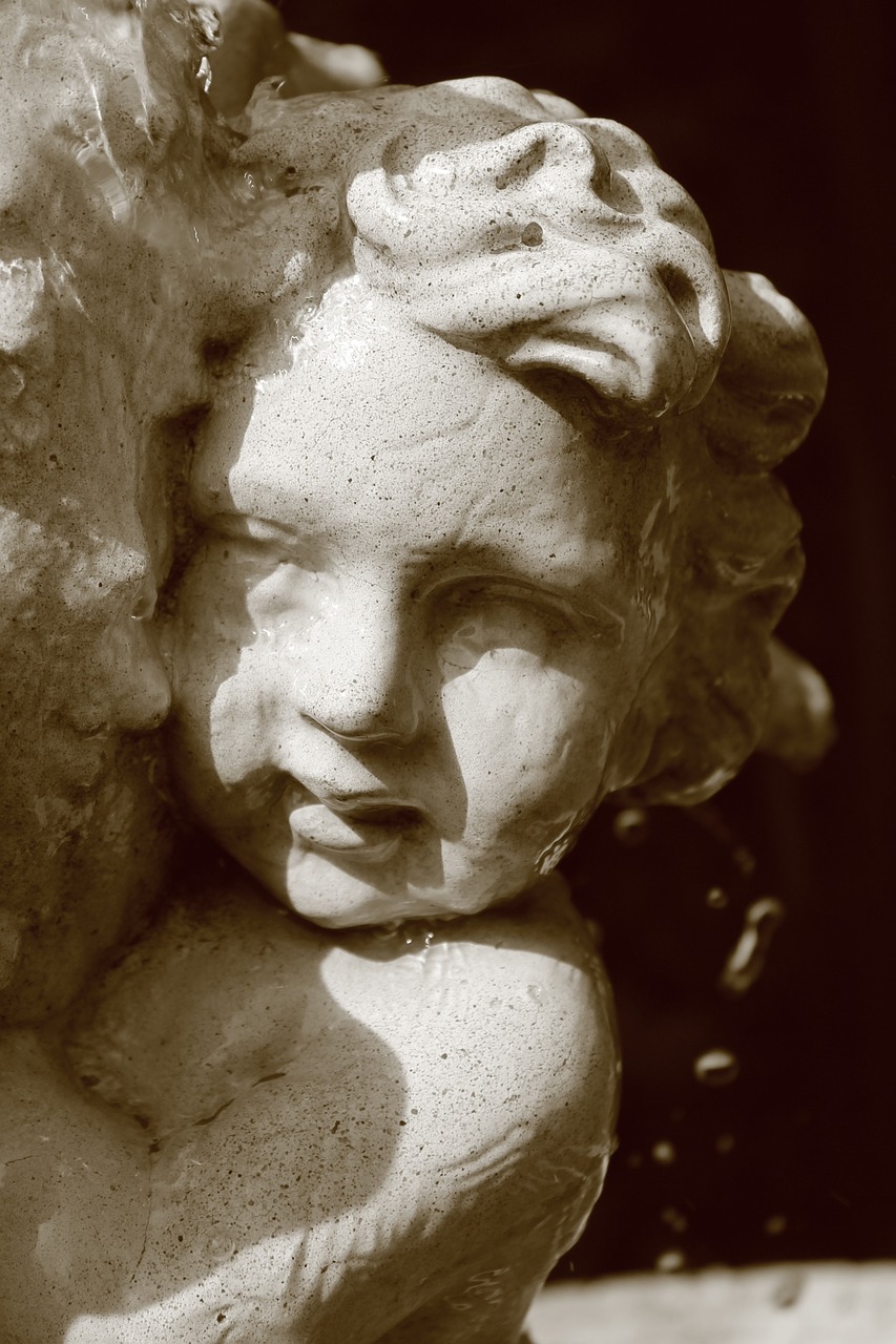 statue cherub water free photo