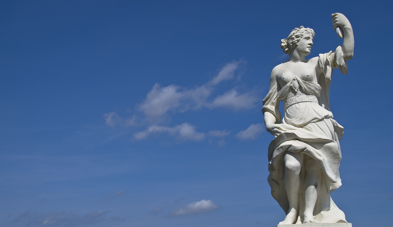 statue blue sky antique free photo