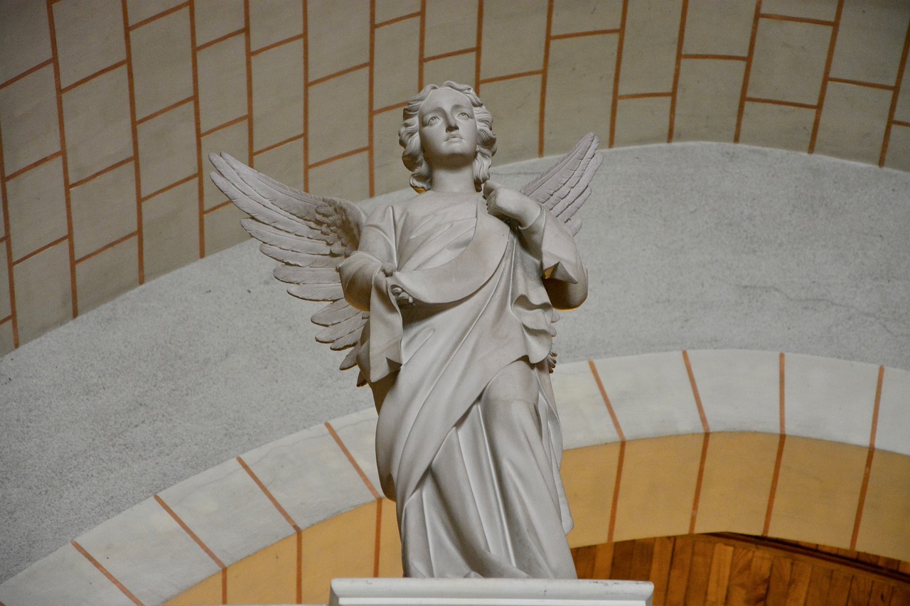 statue angel carved stones church tinteniac brittany free photo