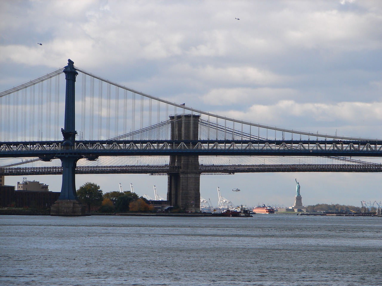 statue of liberty brooklyn bridge bridges free photo