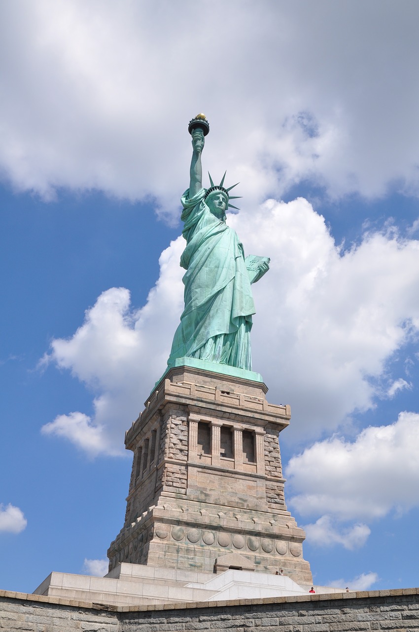 statue of liberty usa clouds free photo