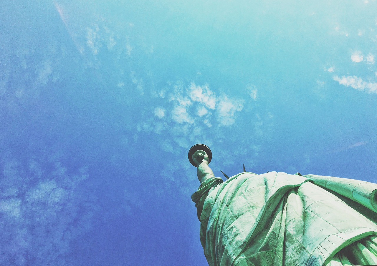 statue of liberty blue sky free photo