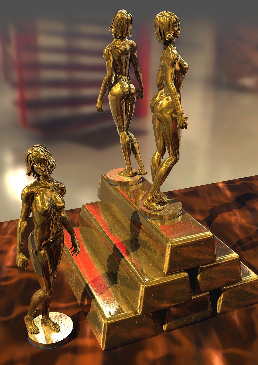 statuettes gold ingots free photo