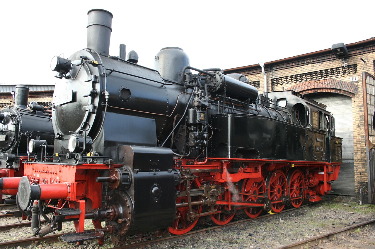 steam locomotive locomotive shed railway free photo