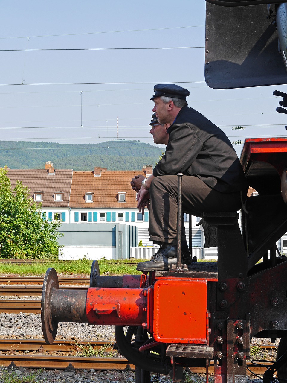 steam locomotive train driver stoker free photo