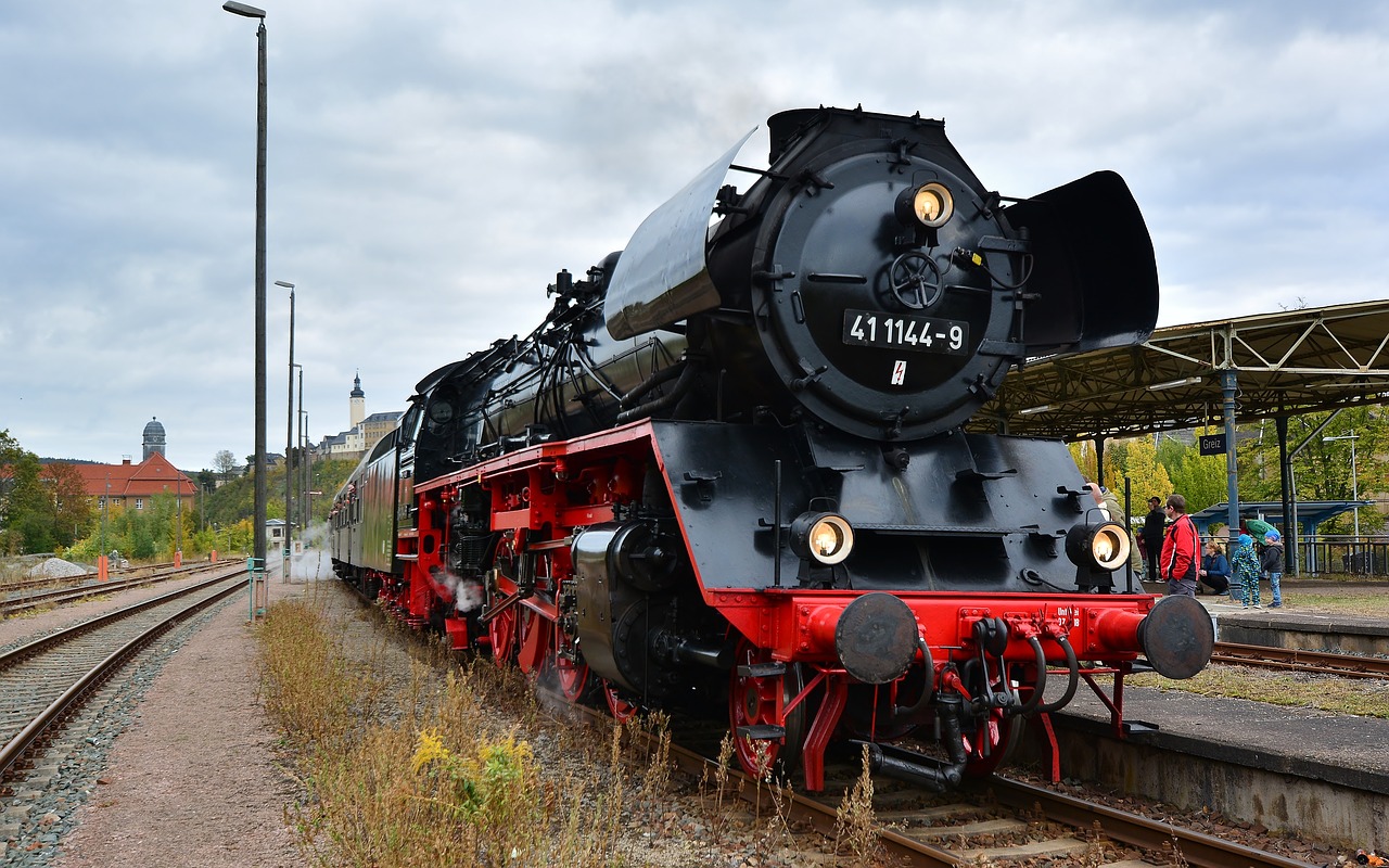 steam locomotive  special crossing  railway station free photo
