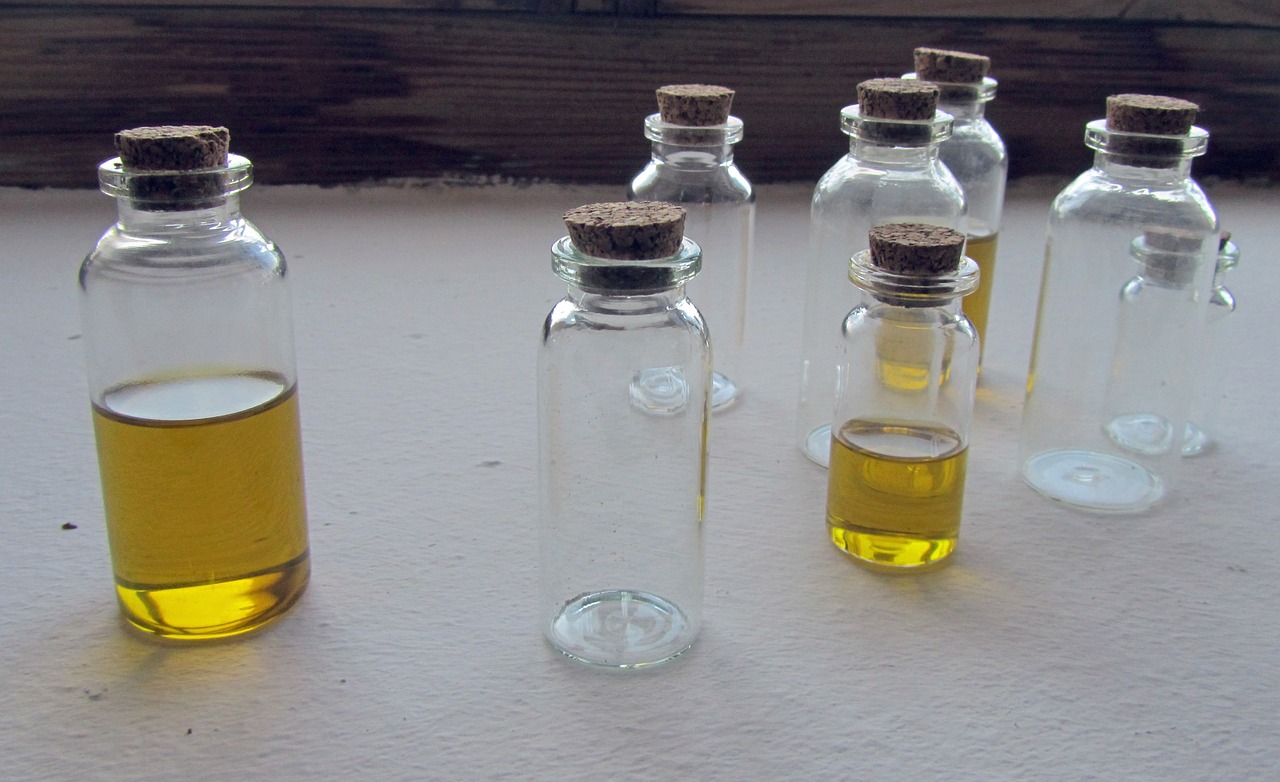 still life bottle oil bottles free photo