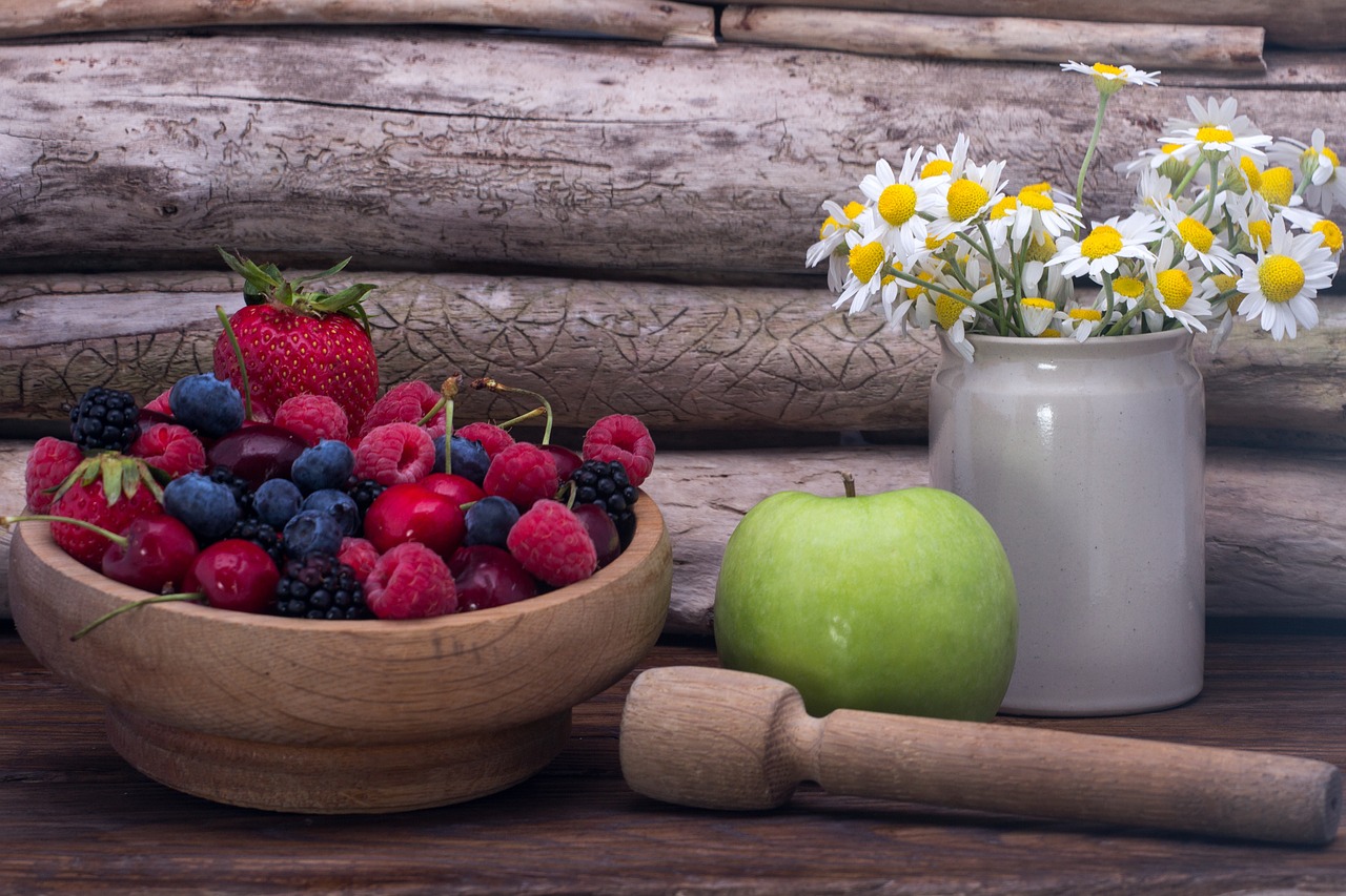 still life berries wooden wall free photo