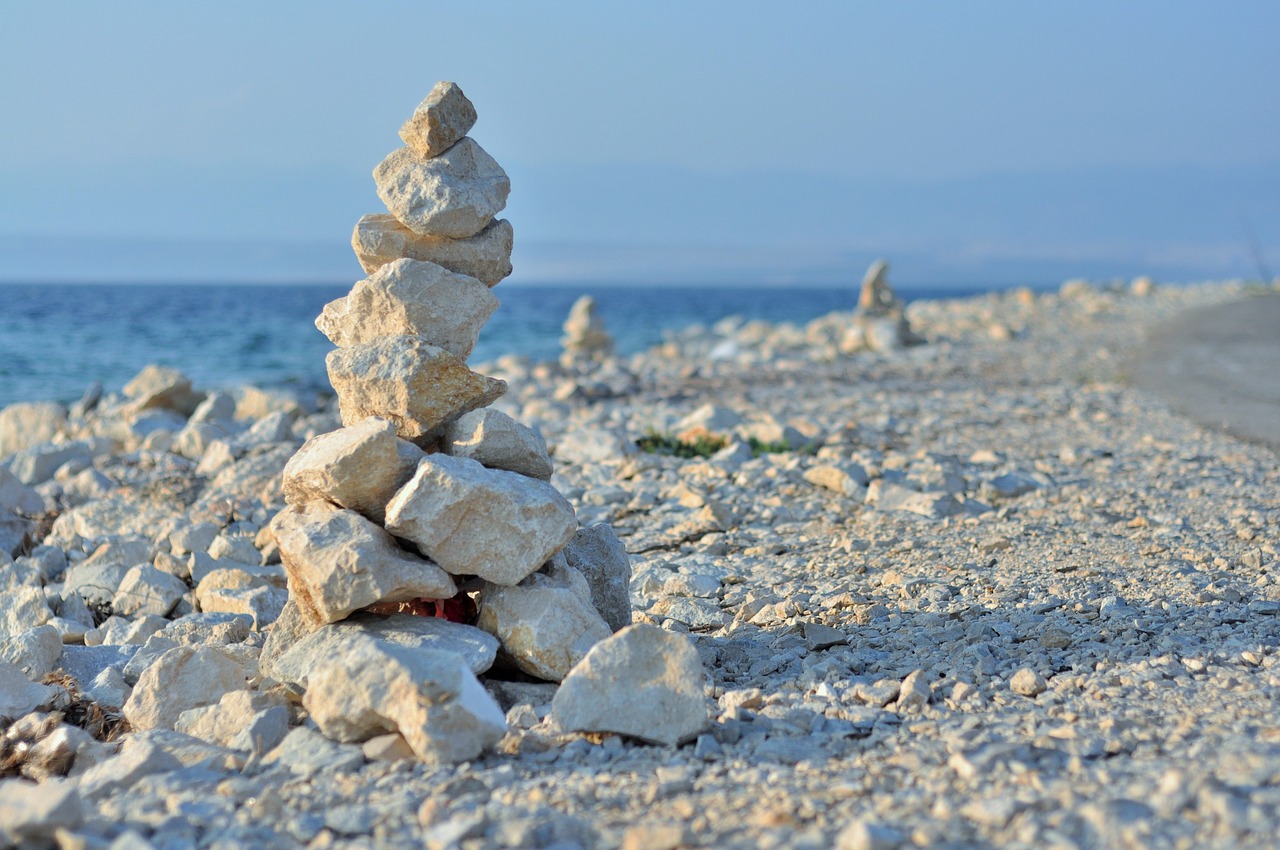 stone cairn piles of stones free photo