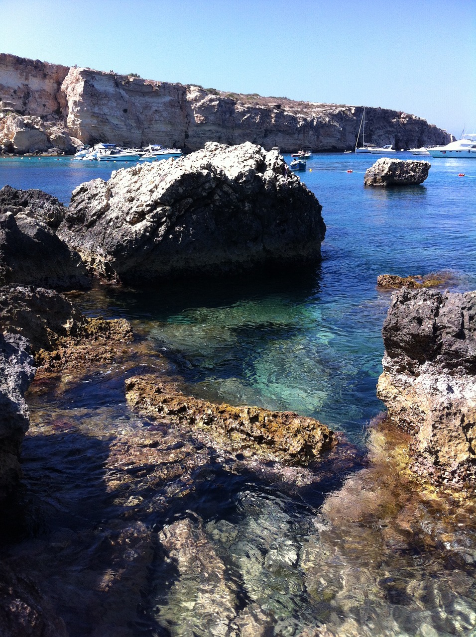 stone cliffs sea free photo