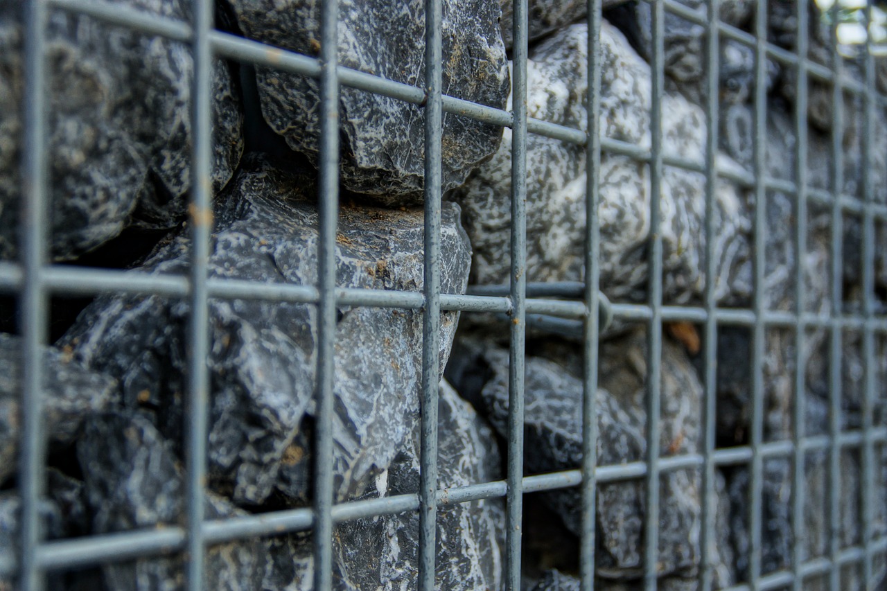 stone iron stone wall free photo