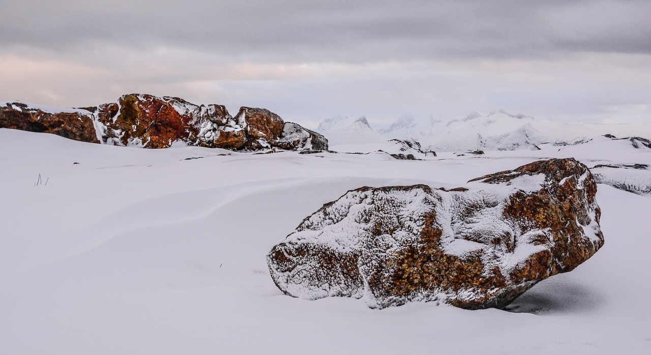 stone snow cloudy free photo