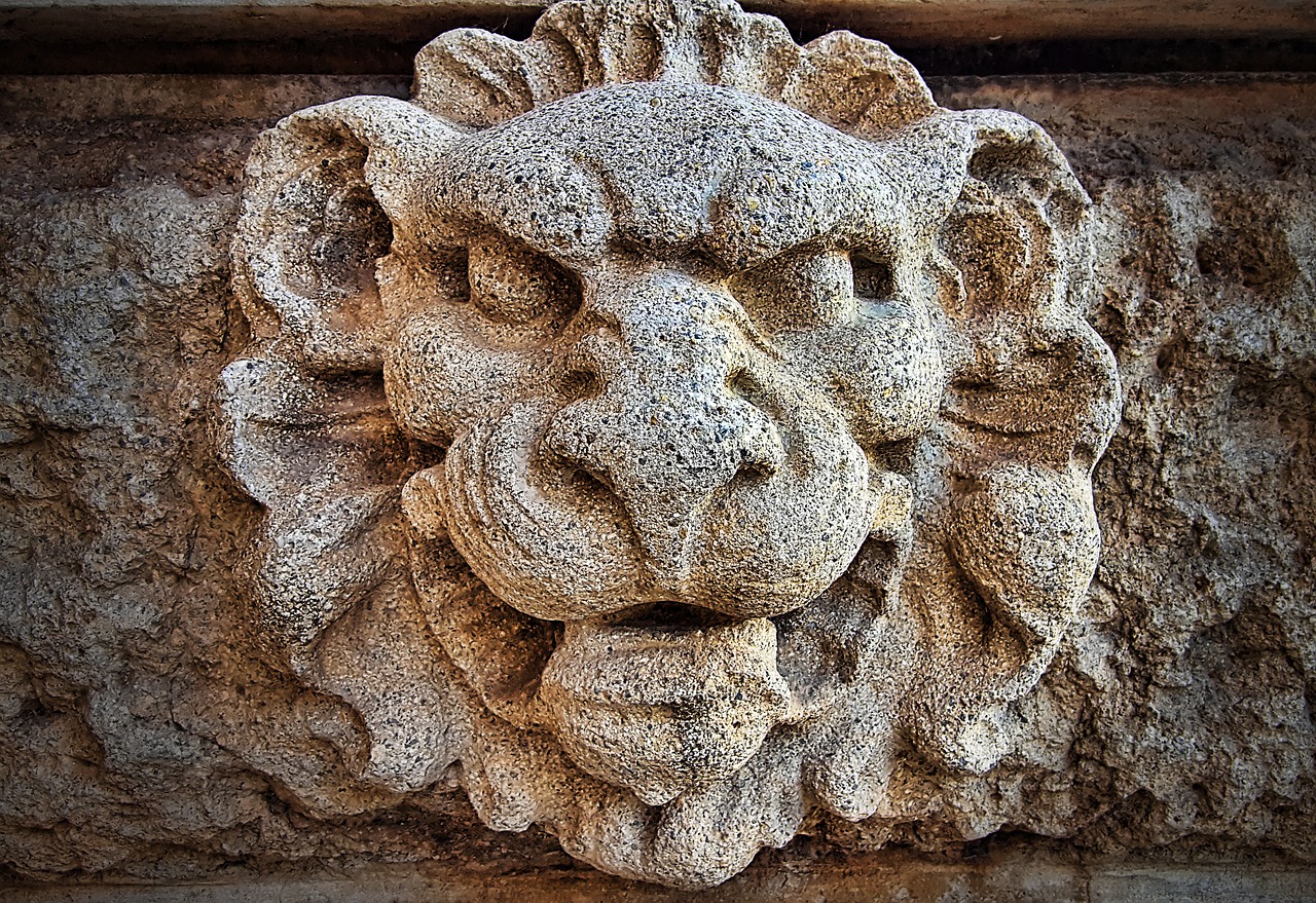 stone lion sculpture free photo