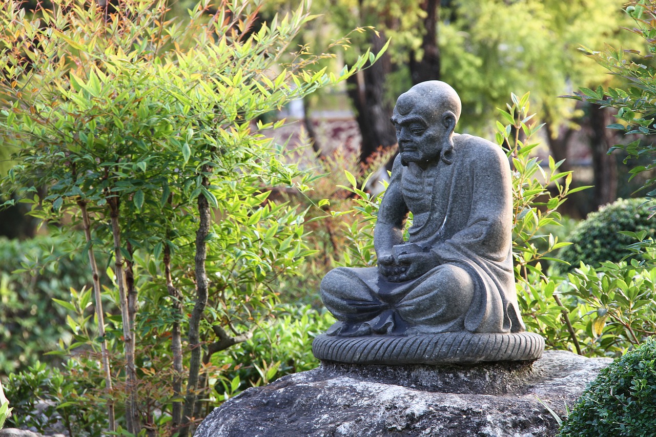 stone statue buddhism free photo