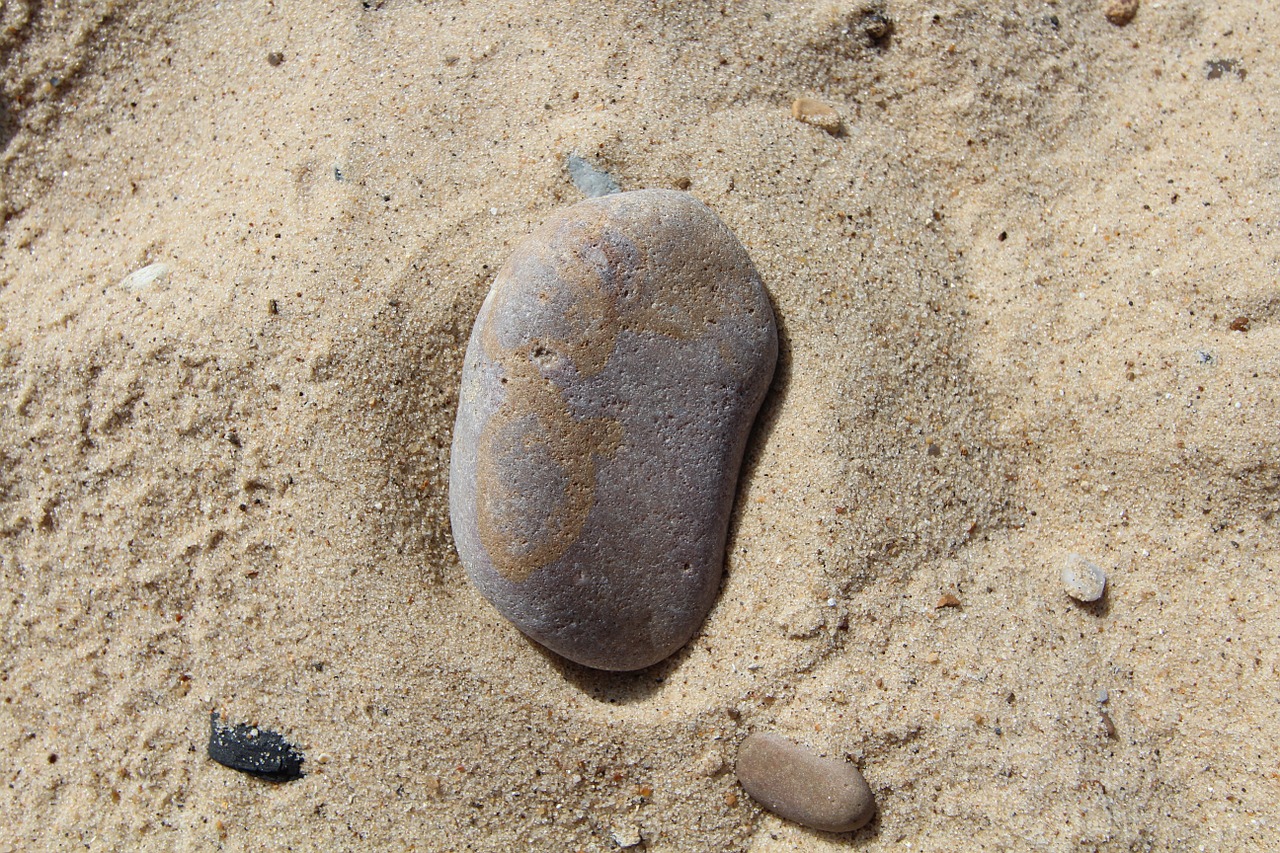 stone sand beach free photo