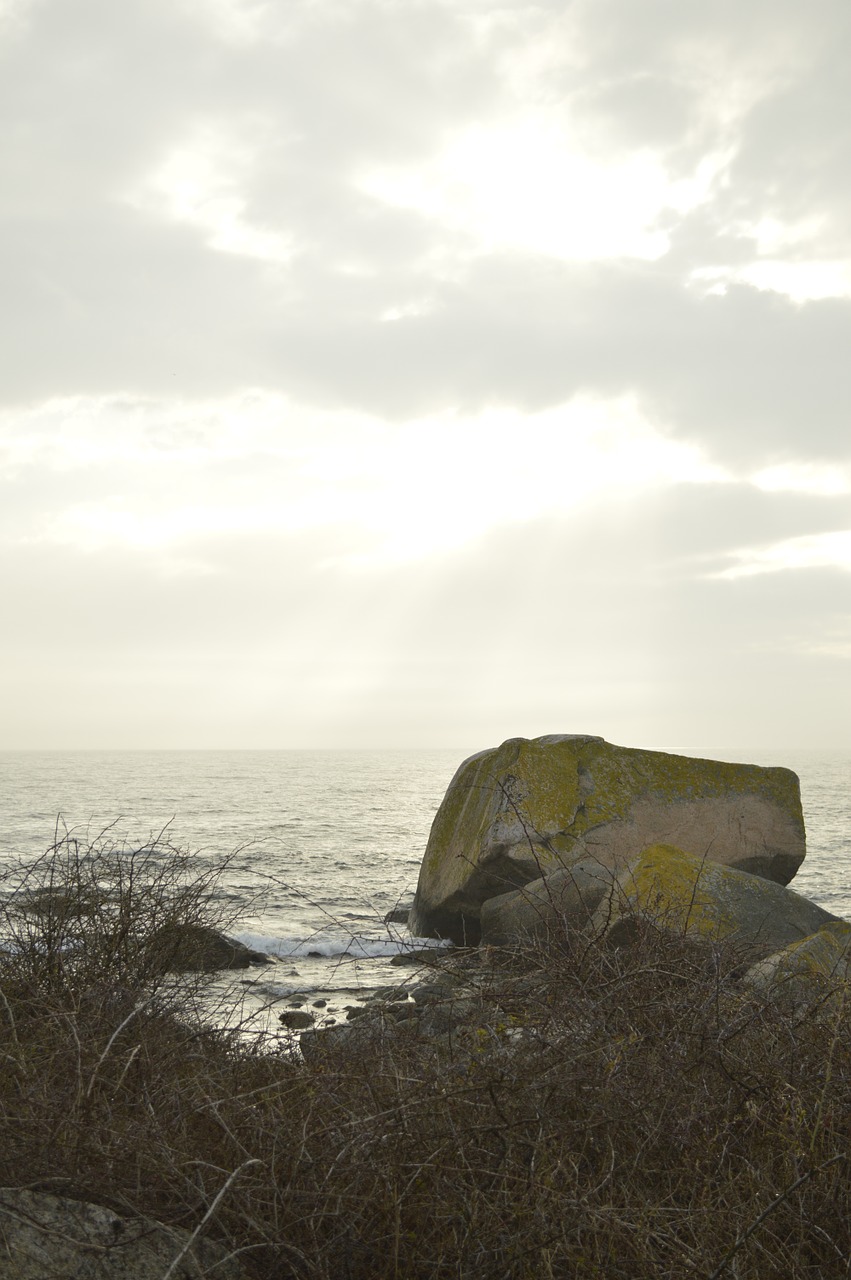 stone sunset sea free photo