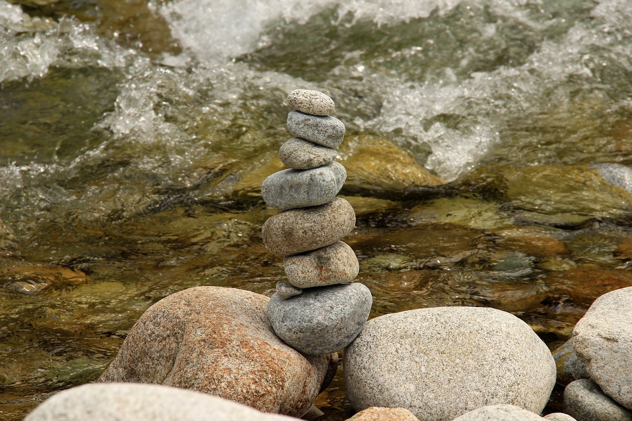 stones pebbles water free photo