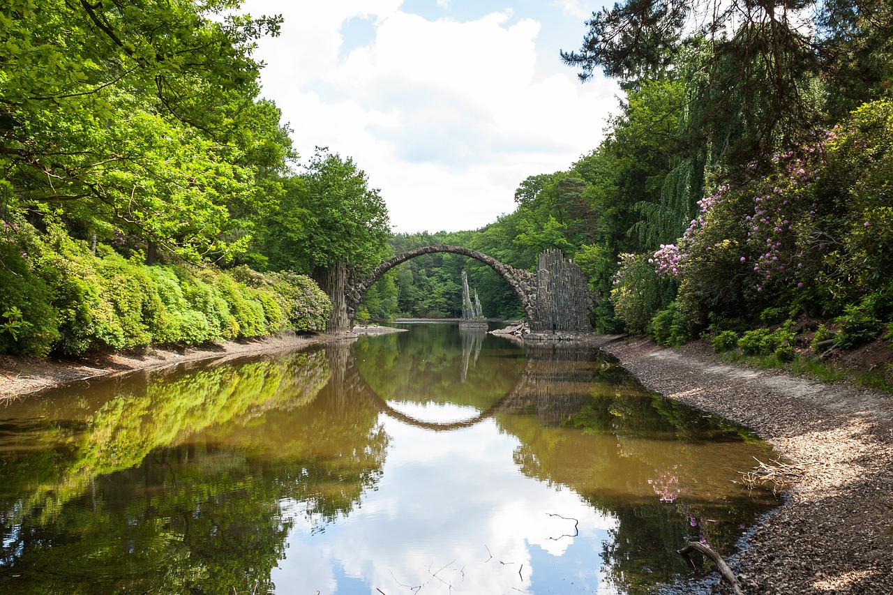 stone arch stone bridge river free photo