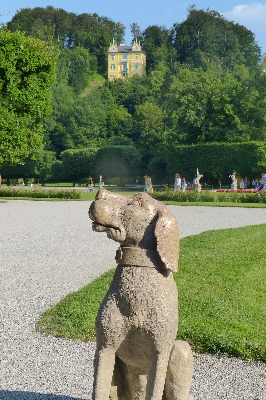 stone dog dog figure free photo