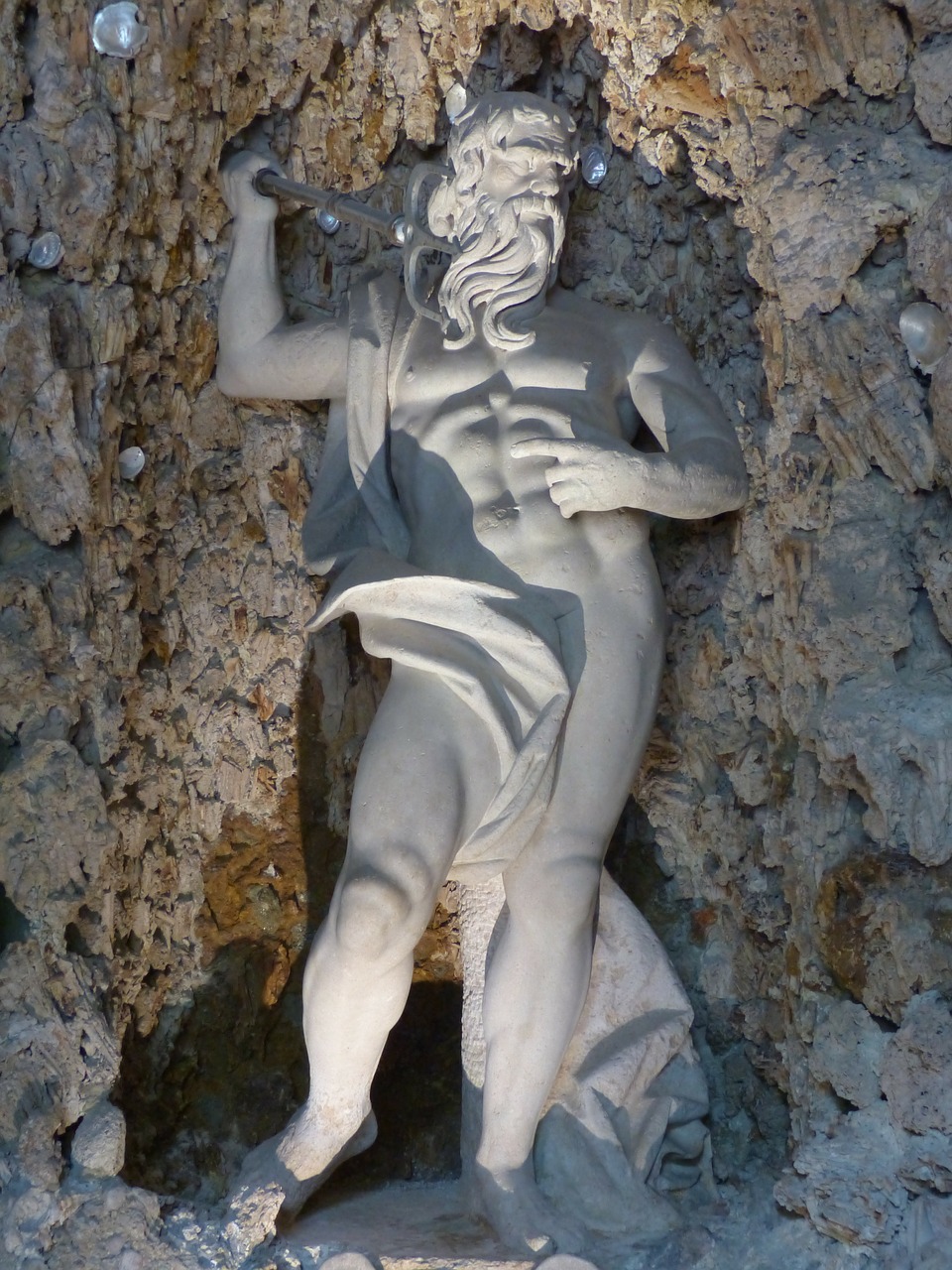 stone figure neptune man free photo