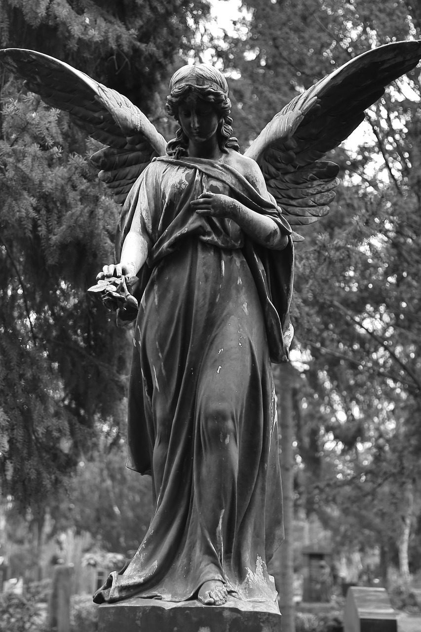 stone figure cemetery sculpture free photo