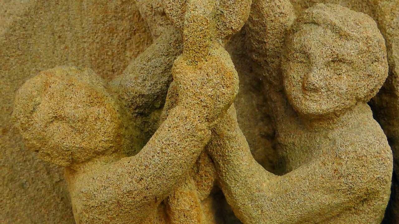 stone figures figures sculpture free photo