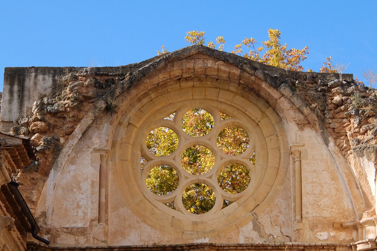 stone monastery  rosette  autumn free photo