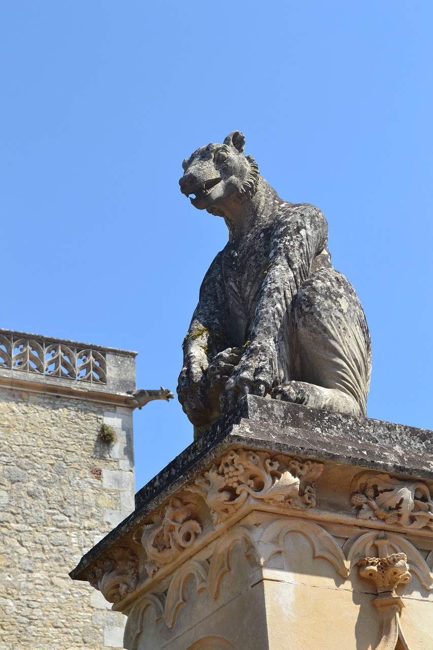 stone statue monster chateau des milandes free photo