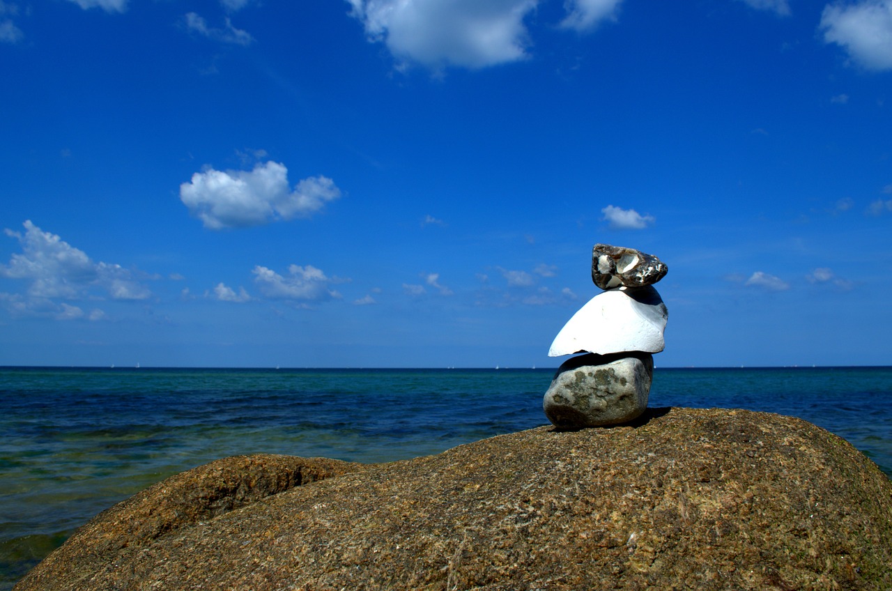 stone tower sea stones free photo