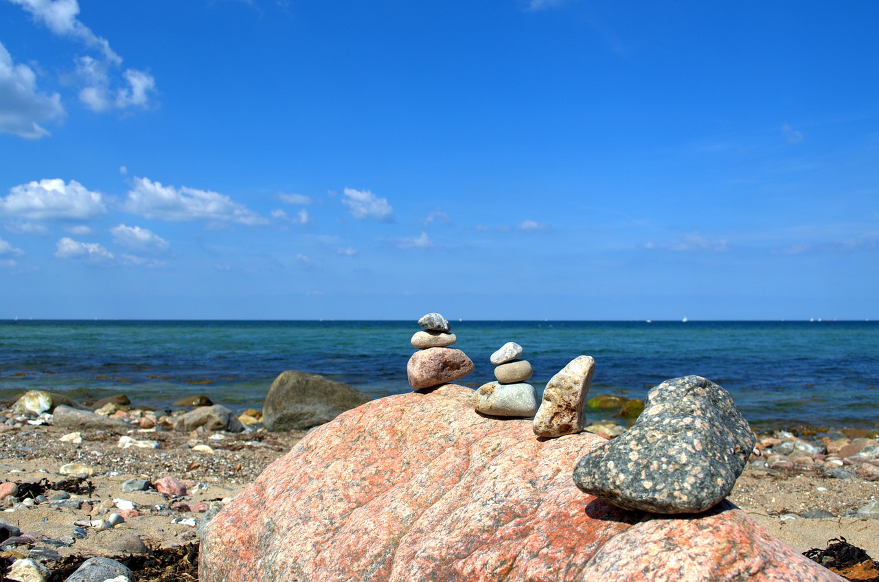 stone tower sea stones free photo