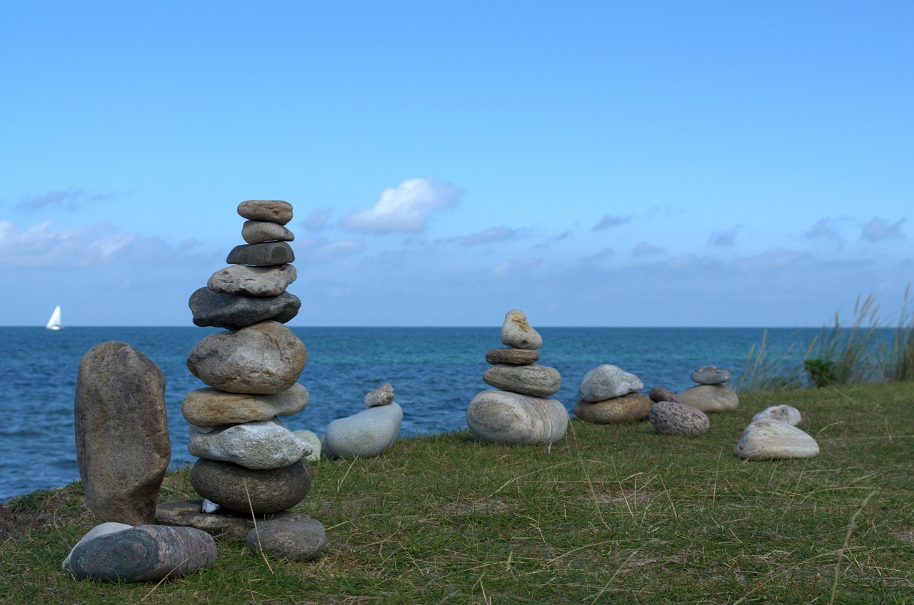 stone tower sea stones free photo