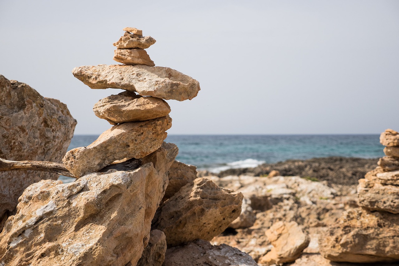 stone tower sea stones free photo