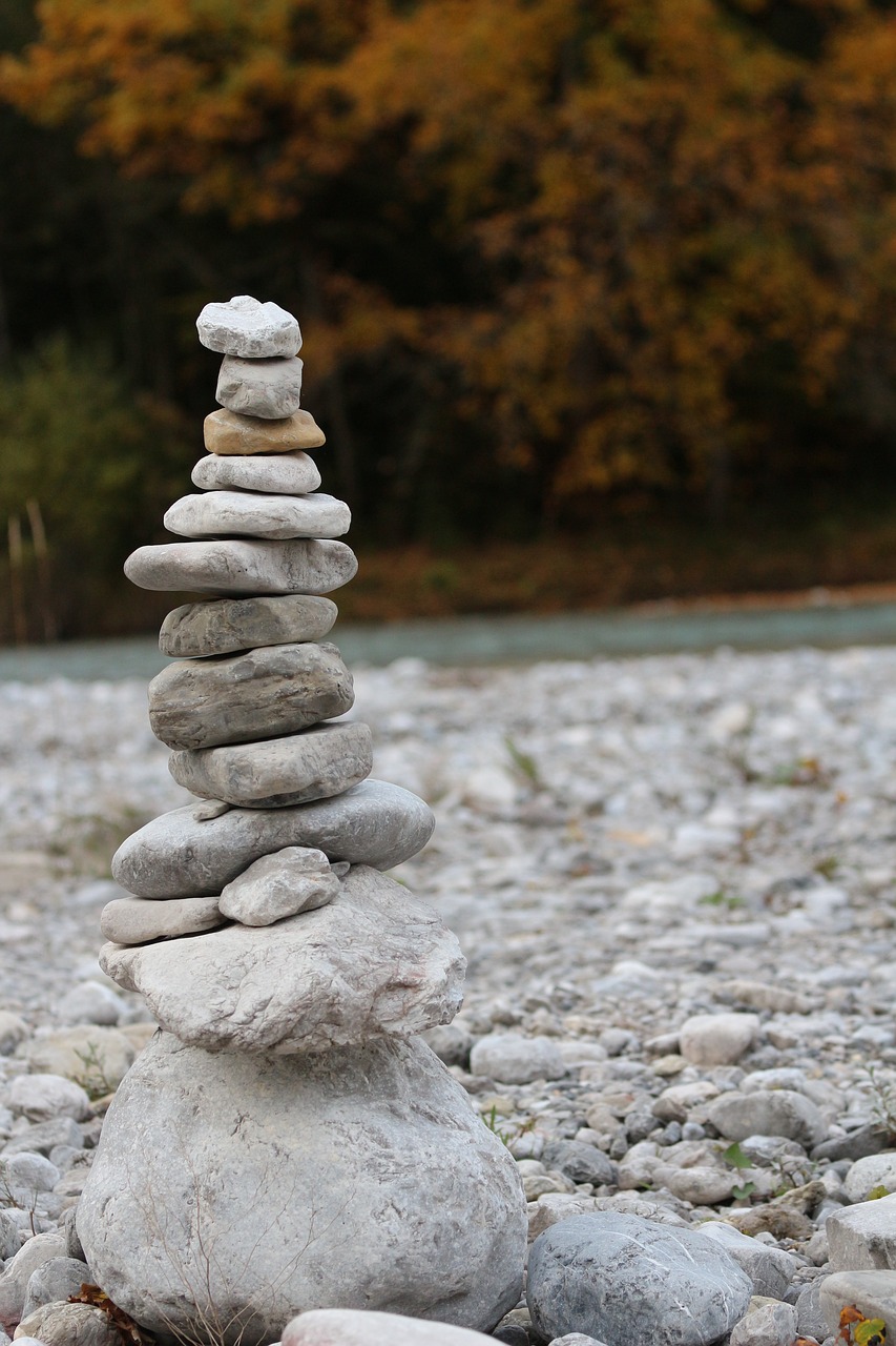 stone tower river water free photo