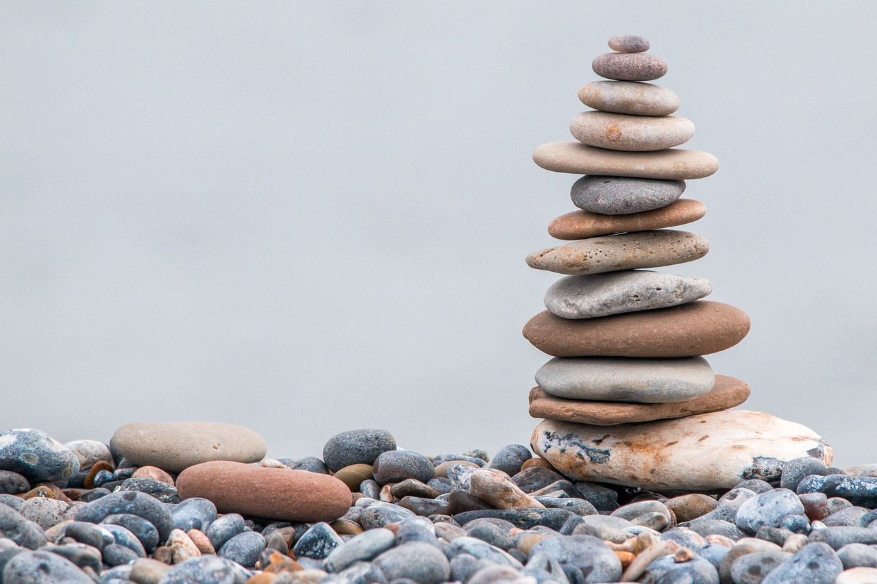 stone tower stones cairn free photo