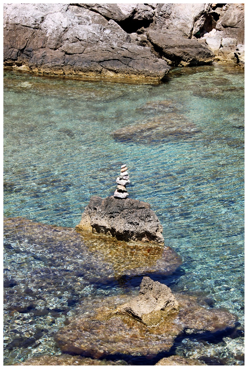stone tower stack sea free photo
